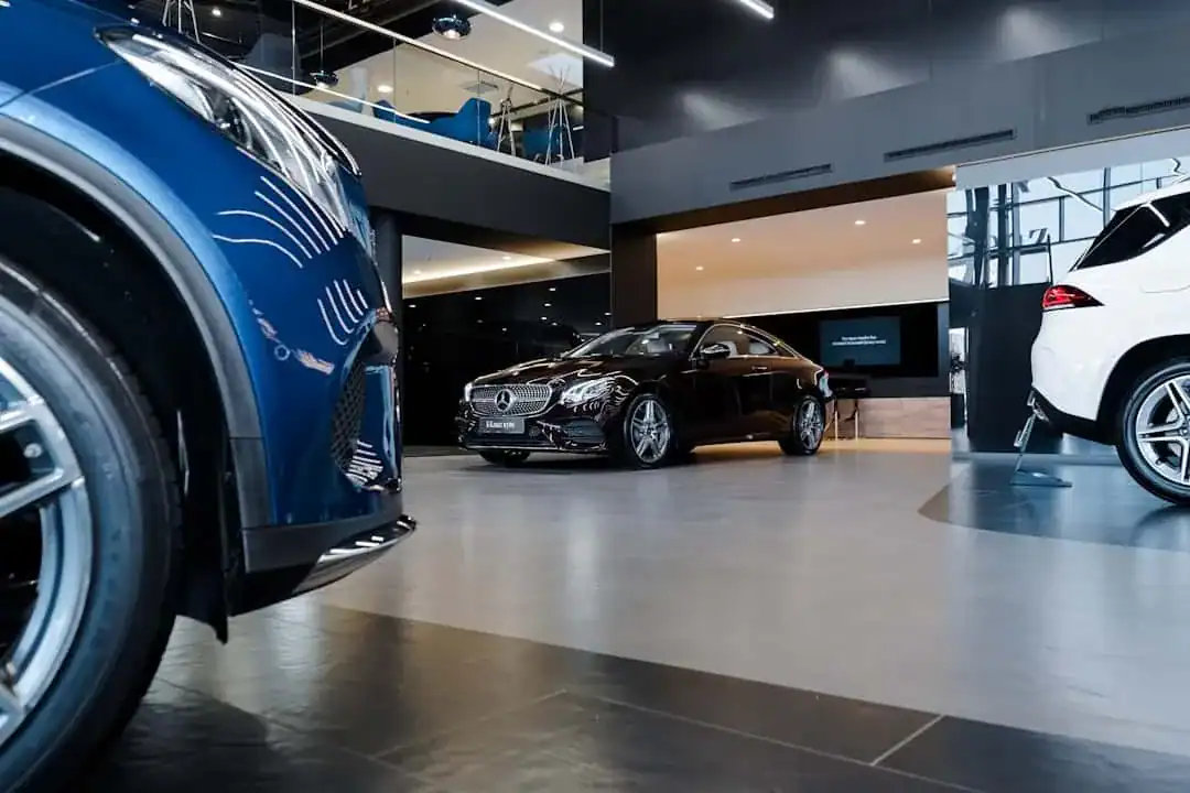 Luxury Mercedes-Benz cars showcased in Willowood Ventures automotive dealership showroom.