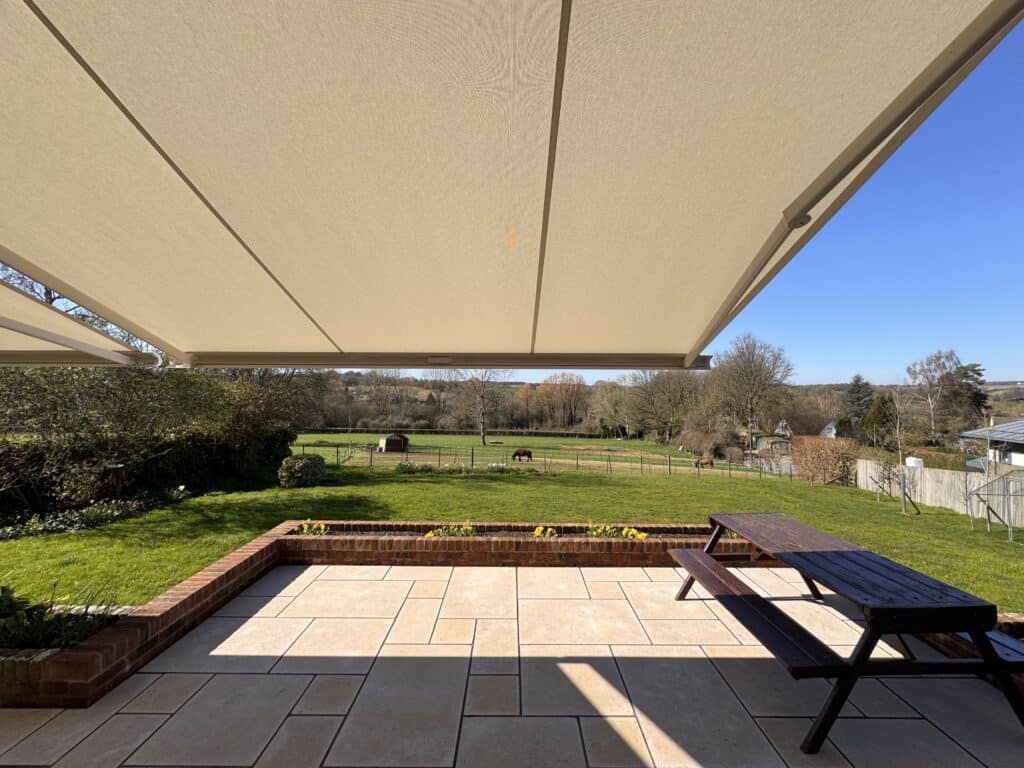 View of country side from under a motorised awning in Alresford Hampshire