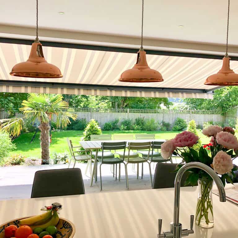 Keeping your home cool in summer with motorised blinds and awnings