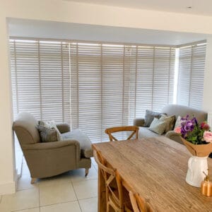 Wood Venetian blinds to patio door in a dining room in Medstead Alton Hampshire