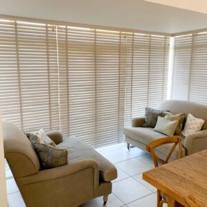 Hard Wood Venetian blinds in a dining room and patio doors in Medstead Alton Hampshire