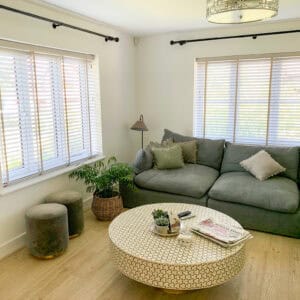 2 Wood Venetian blinds in living room windows in Medstead, Alton Hampshire