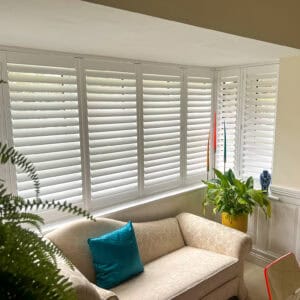 Living room full height shutters in Romsey Hampshire