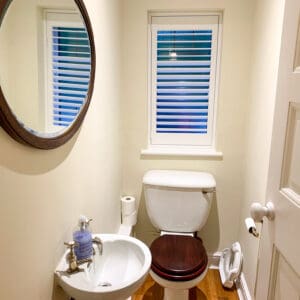full height shutters in a cloakroom to a home in Basingstoke Hampshire