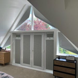 Blackout motorised fanned thermal cellular blinds in bedroom to keep bedroom cooler during the summer