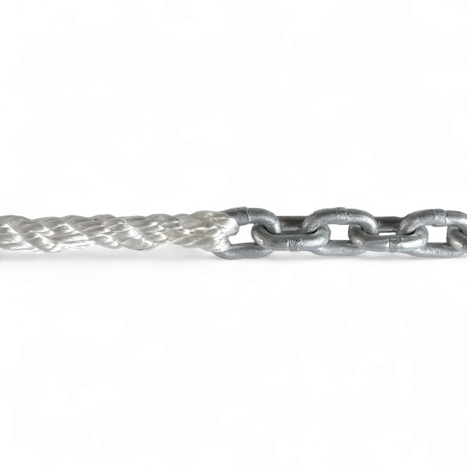 Close-up of the join between three-strand nylon anchor rope and galvanized chain, showing the rope tapered and spliced directly through the end link so the diameter stays even through the join
