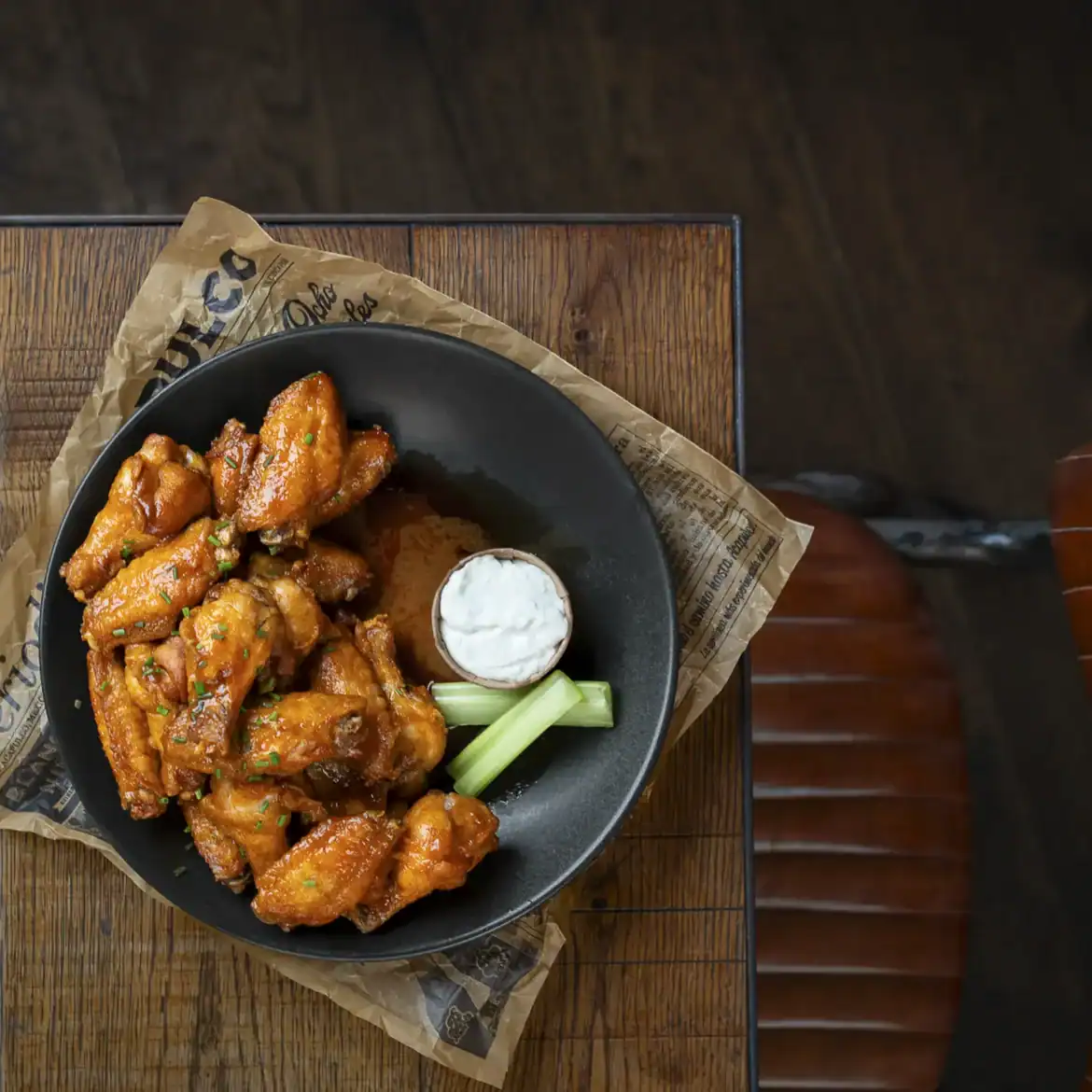 Chicken wings with celery and dipping sauce at Belushi's World Cup.