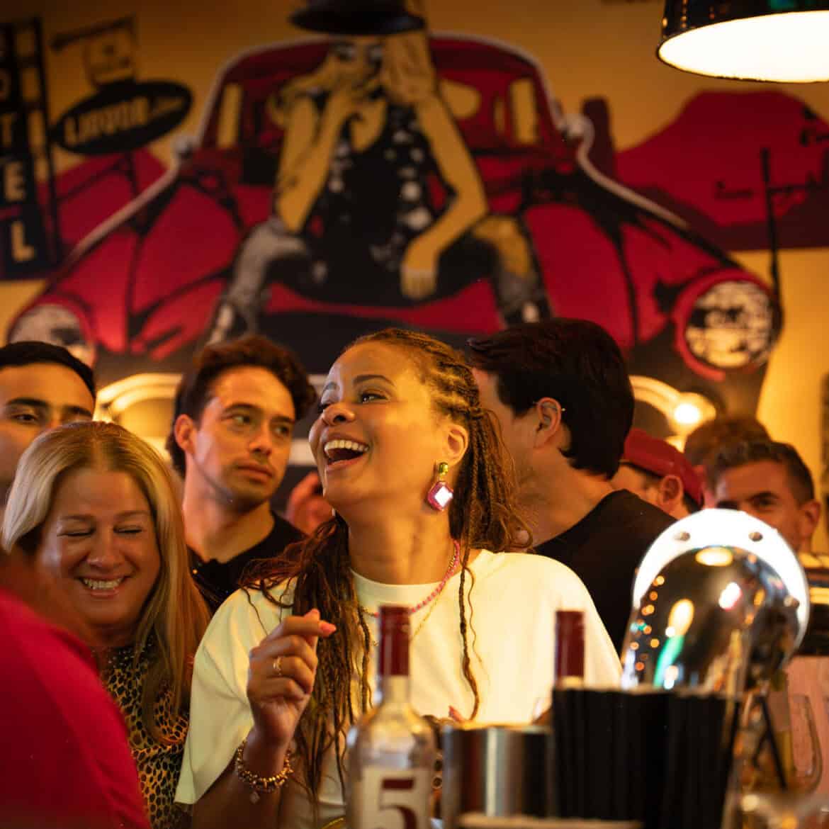 Group of friends enjoying World Cup event at Belushi's pub.
