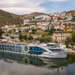Tauck European River Cruise Ship. Ship docked in the middle of a sleepy village.