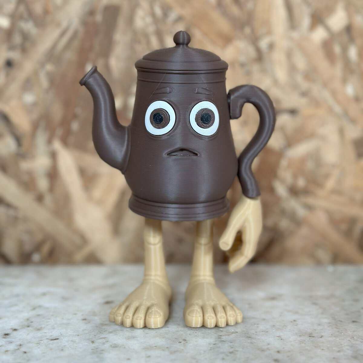 Divertido personaje de thermos en forma de tetera con ojos grandes y expresión sorprendente, fabricado con plástico de alta calidad por 3D Casa Bureu Plásticos, ideal para decoración y colección.