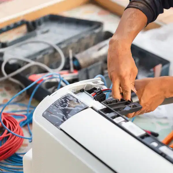 Technician-Repairing-Mini-Split-Indoor-AC-Unit-Wiring