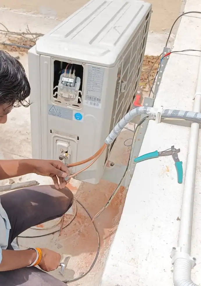Technician-Installing-Samsung-Mini-Split-AC-Copper-Lines