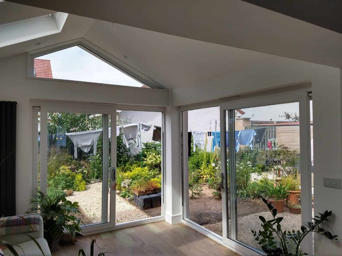 Bright interior with large sliding glass doors.