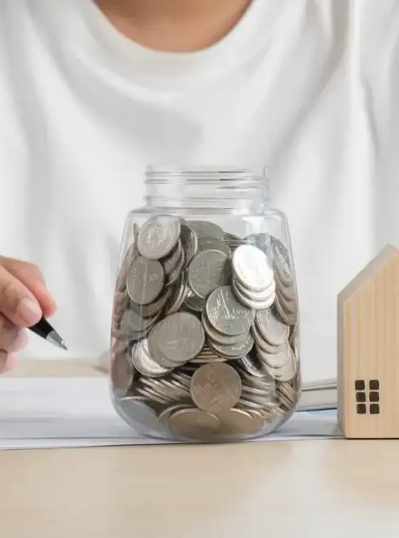 Economical savings jar for home or office.