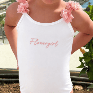 Embroidered flower girl dress with pink floral shoulder details, perfect for special occasions and w.