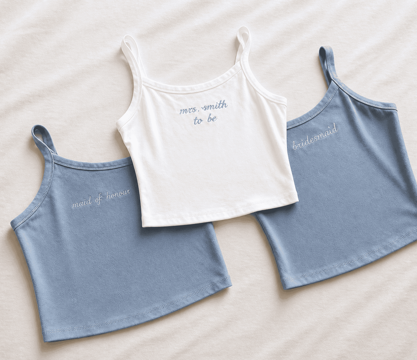 Embroidered tank tops for bridesmaids, maid of honour, and bride-to-be, perfect for wedding preparat.