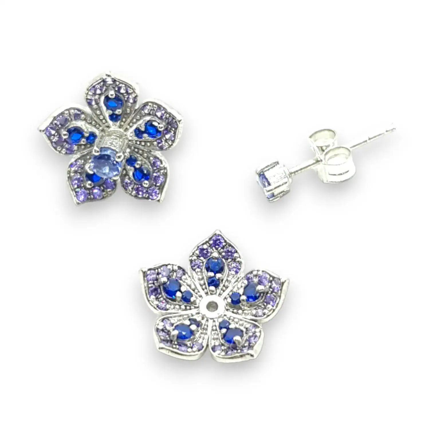 Vibrant blue butterfly jewelry charm with purple gemstone accents and silver setting.