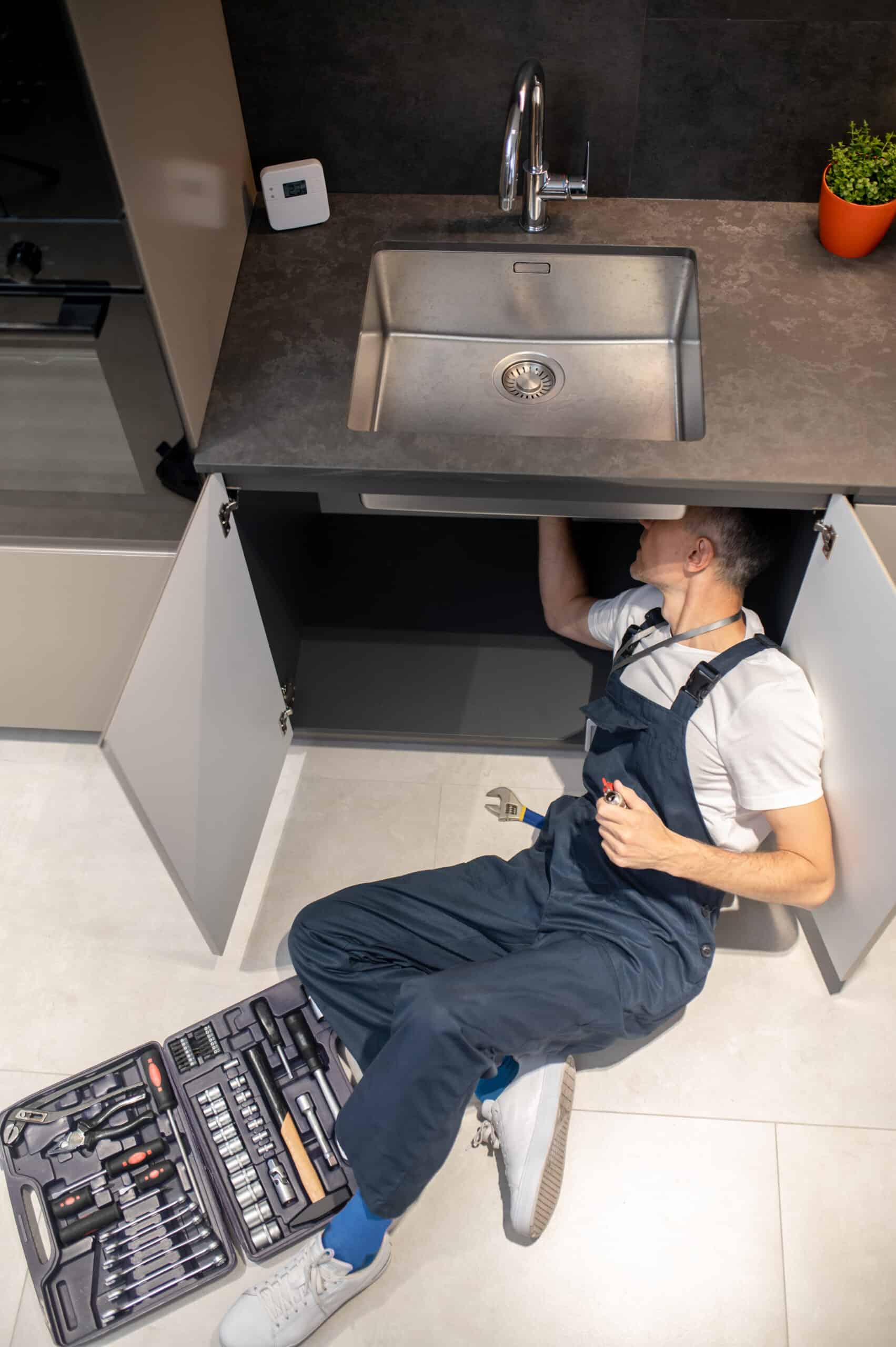 Plumber fix kitchen sink