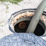 Suction pipe inserted into septic tank for household wastewater removal