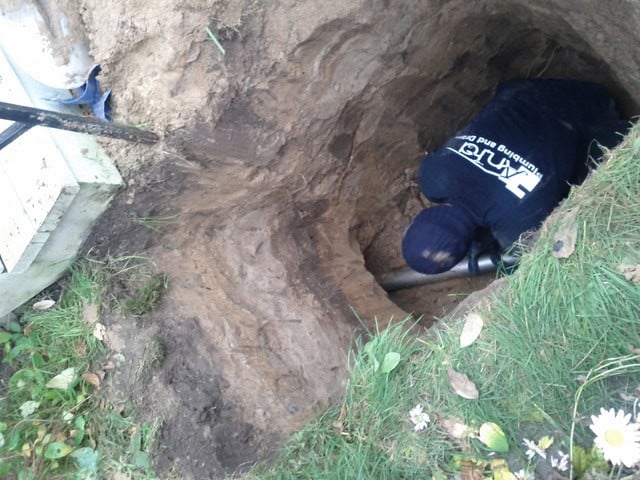Preparing the kit for pipe re-lining by plumber