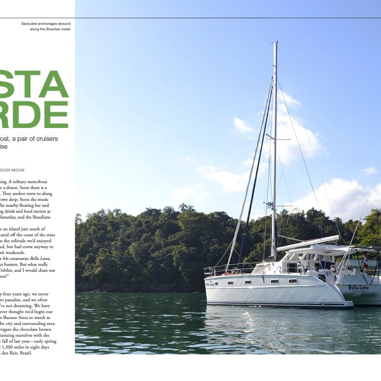Luxurious Antares catamaran sailing on the water with a scenic tropical backdrop, showcasing innovative design and premium craftsmanship.