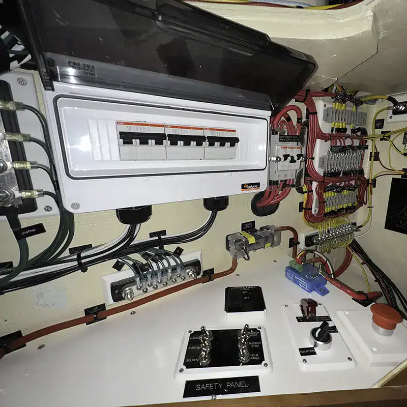 Distribution panel and electrical wiring setup for Antares Catamarans onboard systems, demonstrating advanced electrical management for marine vessels.