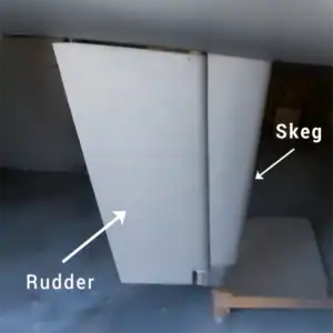 Rudder and skeg structure for Antares Catamarans sailboats, showcasing durablecomponents for enhanced navigation and stability.