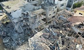 Explosion damage in Tehran after Israeli airstrikes, showing destroyed buildings and debris.