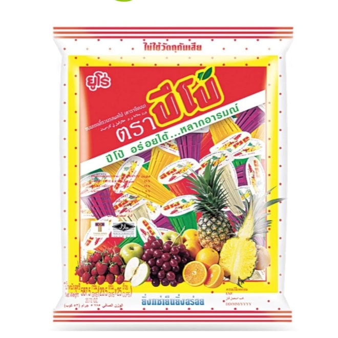 Asiatischer Lebensmittel Online-Shop, Fruchtmix mit Ananas, Trauben und Zitrusfrüchten.