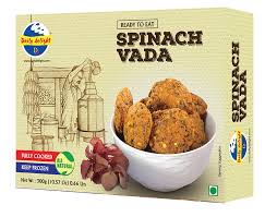 Asiatische Lebensmittel Online-Shop, Spinach Vada in Schüssel, indisches Snackgericht.