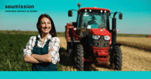 Smiling woman and red tractor in sunny field.