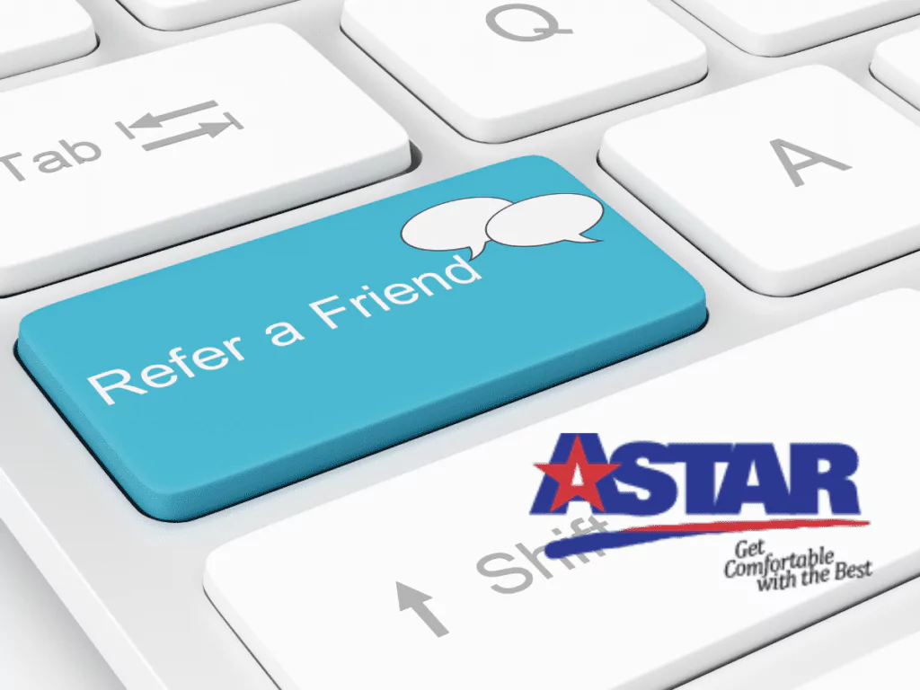 Blue "Refer a Friend" key with speech bubbles on a keyboard. ASTAR logo below with the phrase "Get Comfortable with the Best.