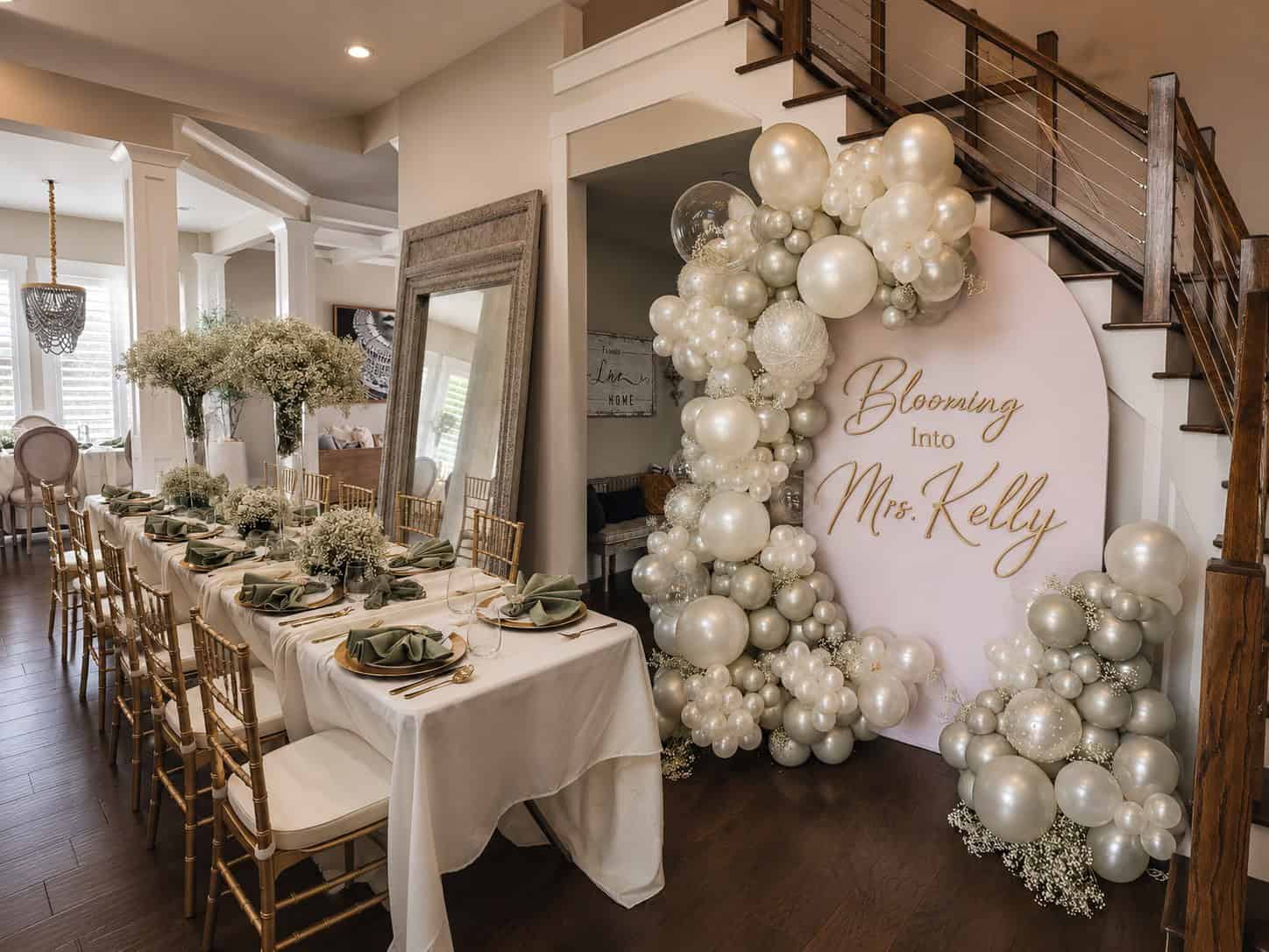 Balloon Decor Pricing Luxury bridal shower featuring a custom pearl white, silver, and champagne organic balloon garland surrounding a personalized round backdrop with elegant tablescapes and floral décor. Atlanta Balloon Designer created this sophisticated event design using premium balloon decorations, custom backdrops, event rentals, organic balloon arches, specialty balloons, luxury event décor, and professional installation for bridal showers, weddings, engagement parties, and upscale celebrations throughout Metro Atlanta.