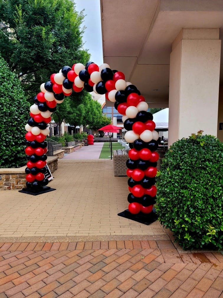 Balloon Decor Pricing Luxury bridal shower featuring a custom arch backdrop with elegant pearl white organic balloon garland, specialty pearl balloons, and sophisticated tablescape styling for the "Blooming Into Mrs. Kelly" celebration. Designed by Atlanta Balloon Designer, this custom backdrop creates an elegant focal point for bridal showers and engagement celebrations. Atlanta balloon stylist specializing in balloon decorations, luxury balloon arches, custom backdrops, event décor, event rentals, floral styling, and upscale celebrations throughout Metro Atlanta.