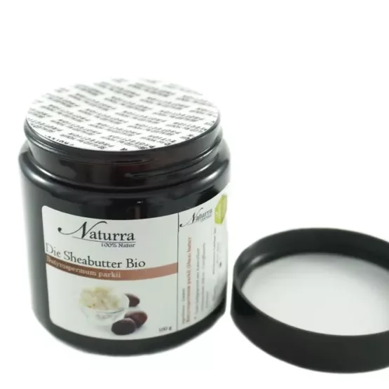 100g Bio Sheabutter unraffiniert und nativ im Braunglastiegel mit geöffnetem Deckel für natürliche Hautpflege und DIY-Kosmetik