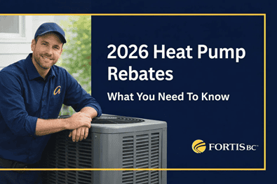A technician in a blue uniform leans on a heat pump next to text that reads "2026 Heat Pump Rebates: What You Need To Know" with the FortisBC logo.