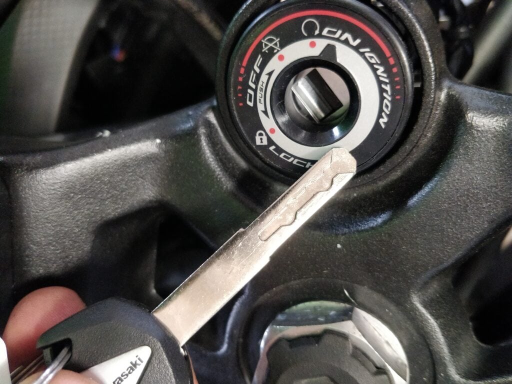 Key in ignition switch of motorcycle.
