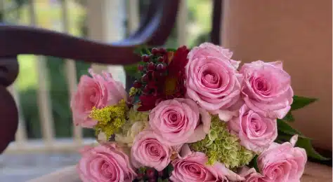 Beautiful pink roses bouquet with green accents, perfect for celebrations and gifting.