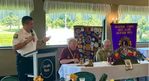 Lions Club meeting at Cascades Manor with speaker and members.