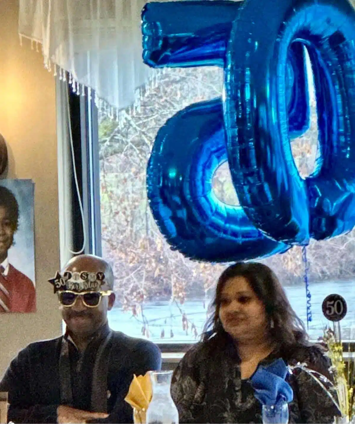 Happy 50th anniversary celebration with children and decorations at Cascades Manor.