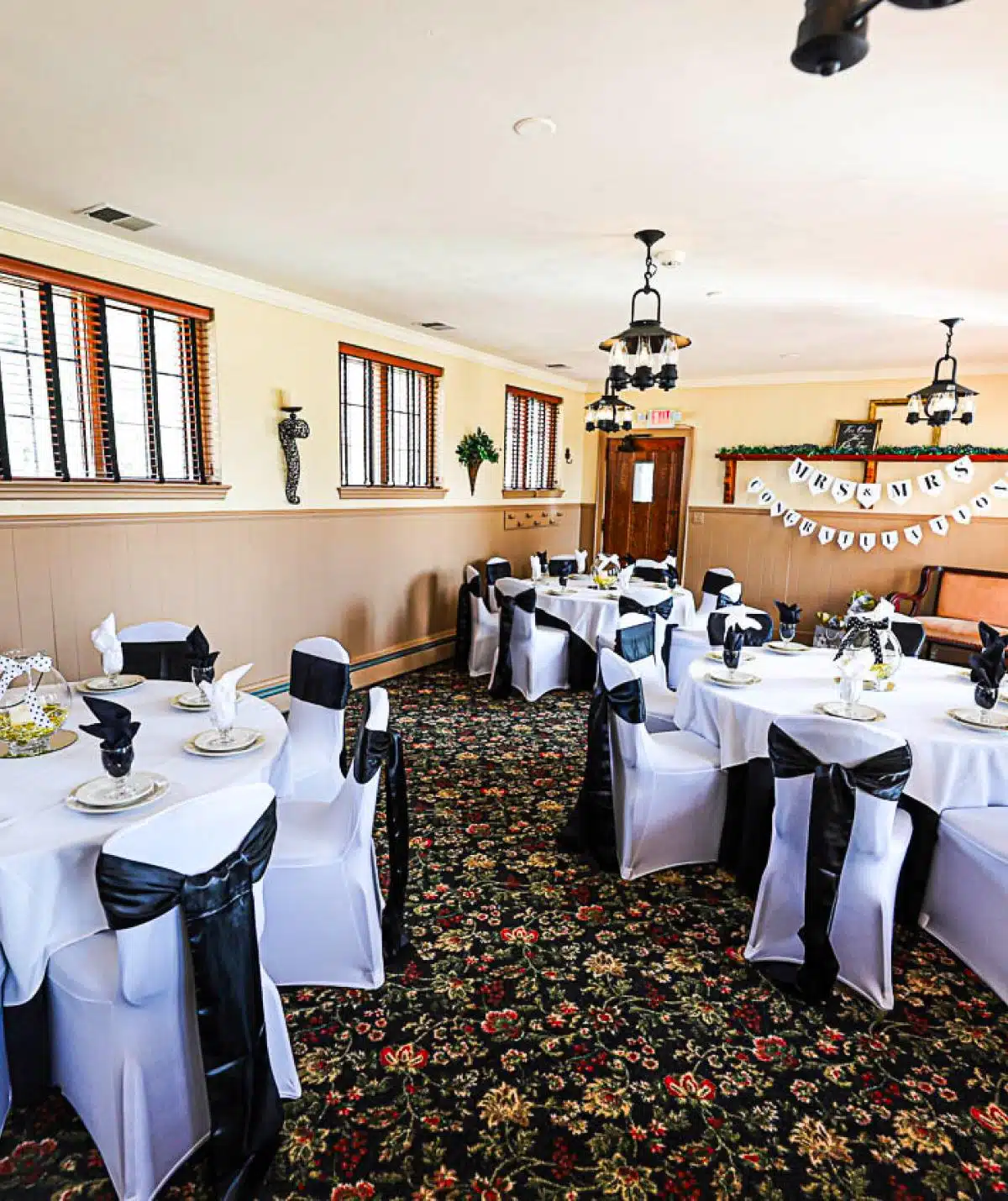 East wing decorated for black and white wedding party