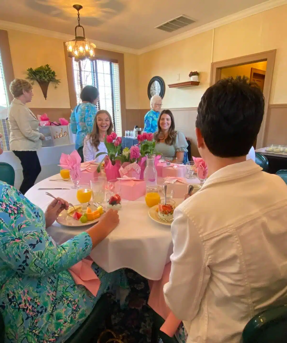 family and friends celebrating at bridal shower