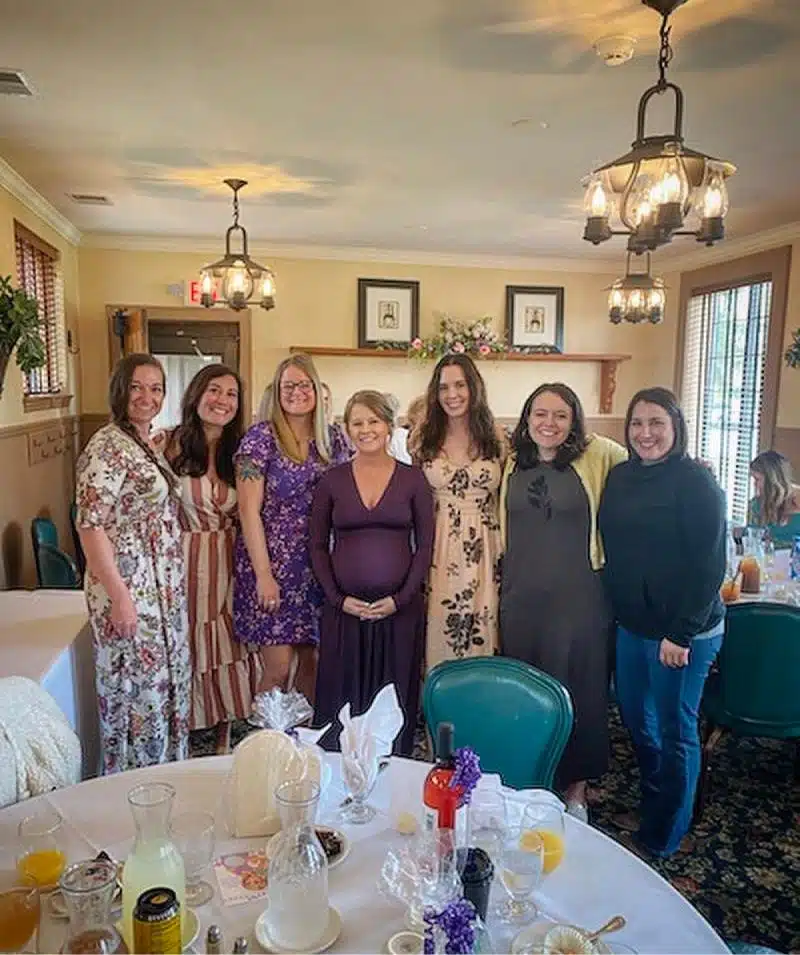 Group of women celebrating at Cascades Manor event venue.