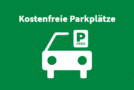 Kostenfreie Parkplätze in Einbeck mit P-Schild und Fahrrad.