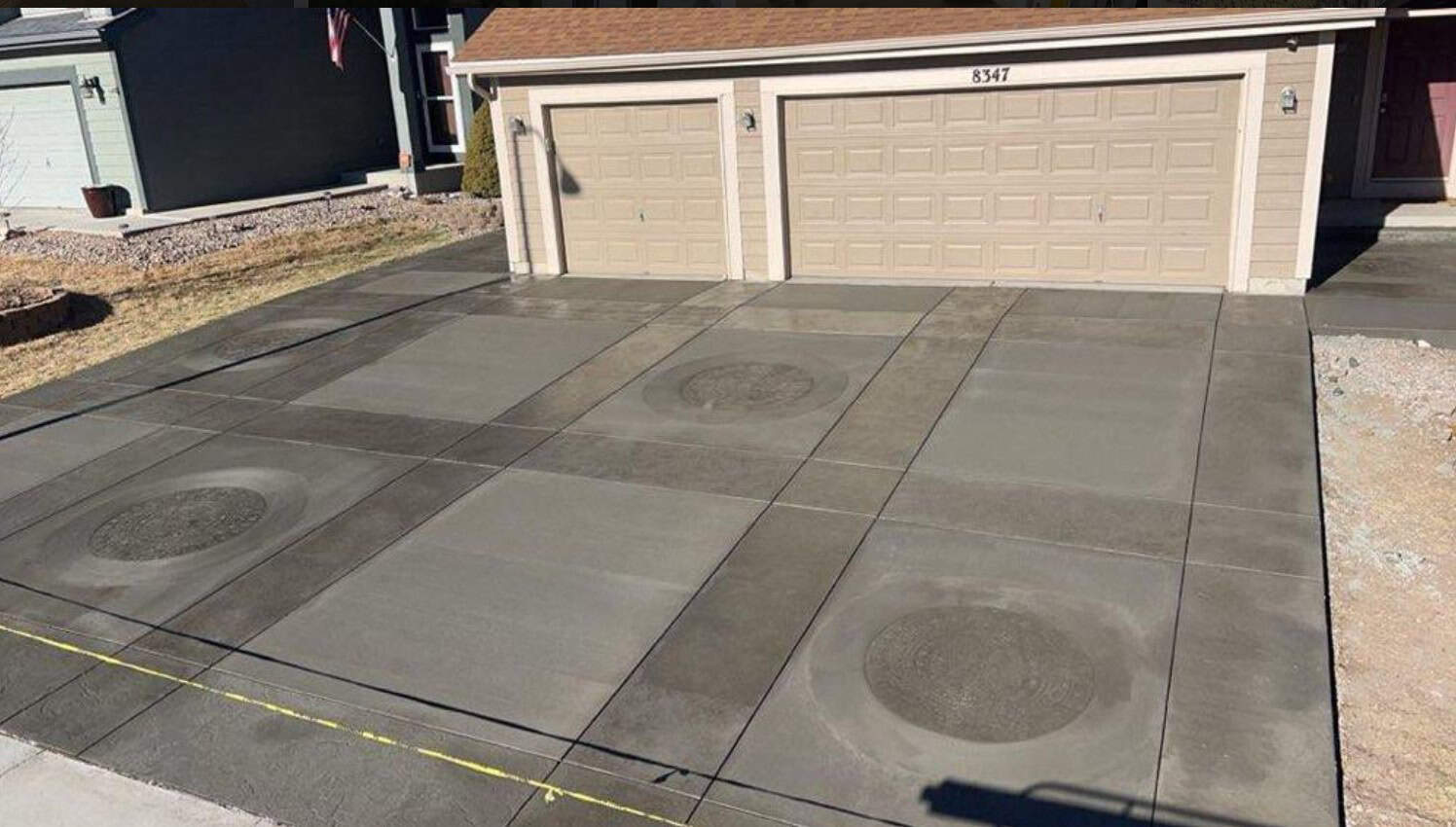 Stamped concrete driveway Colorado Springs - decorative pattern driveway