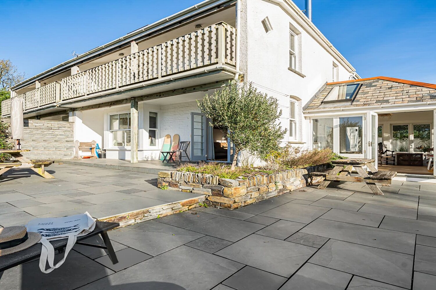 Stylish seaside holiday home with outdoor terrace in Cornwall, perfect for relaxing stays.