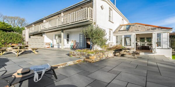 Stylish seaside holiday home with outdoor terrace in Cornwall, perfect for relaxing stays.