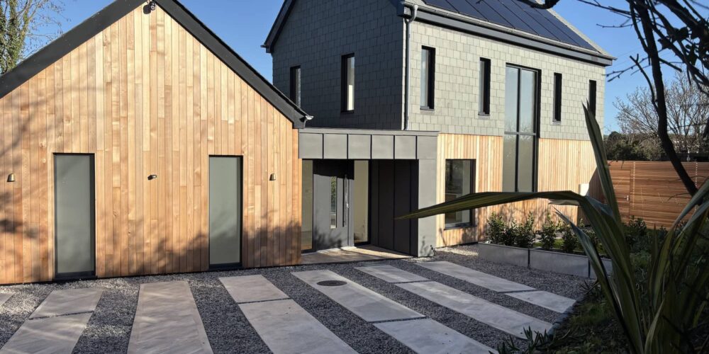 Modern eco-friendly house with solar panels in Cornwall.
