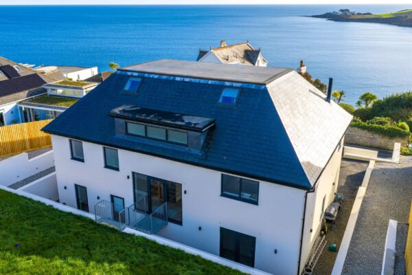 Elegant holiday home overlooking the Cornish coast, perfect for seaside retreats.