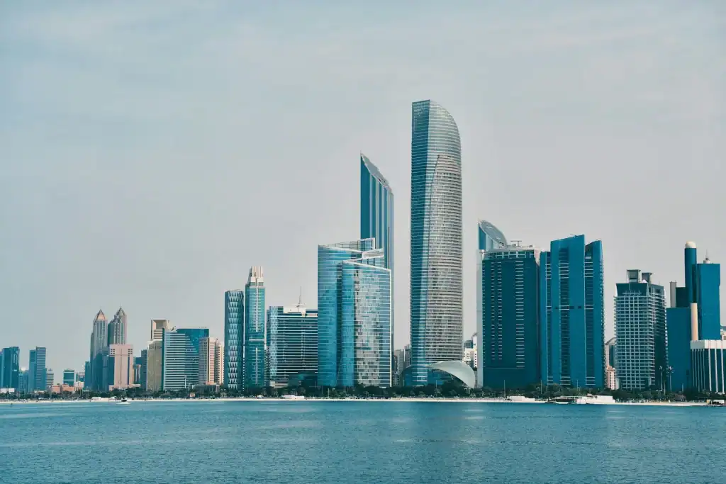 Dubai Marina skyline featuring tall modern skyscrapers and waterfront view.